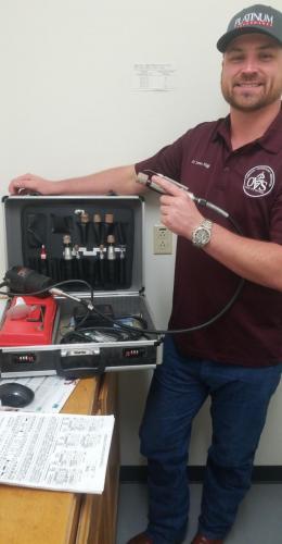 Dr. Hogg and his equine motorized dental instruments